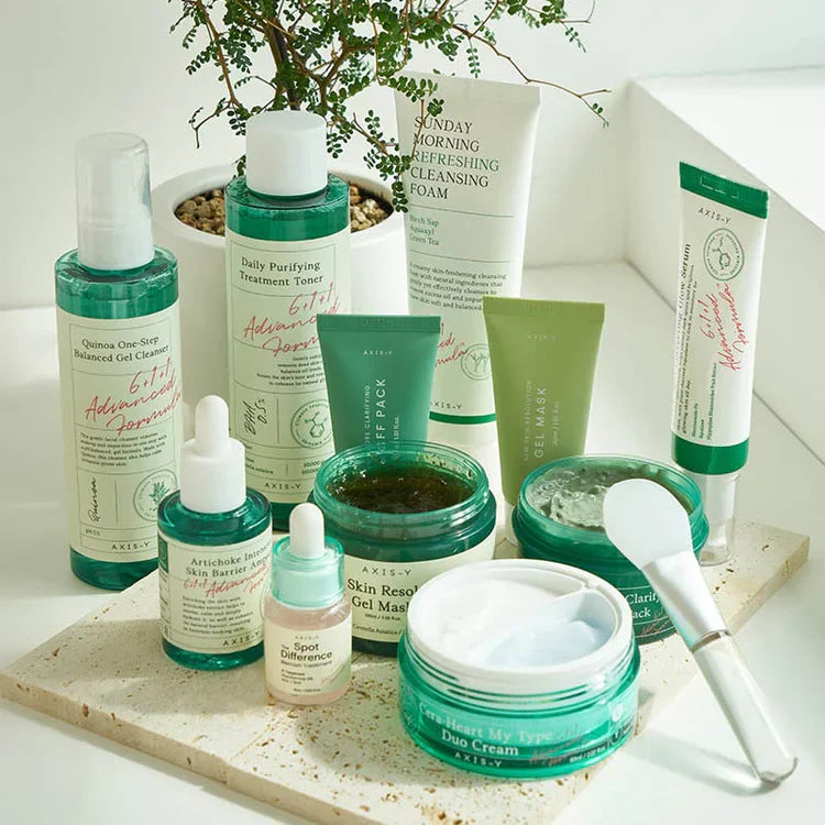 produits axis-Y devant un pot de fleur sur une dalle en marbre  collection
